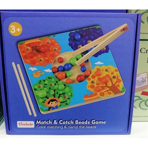 Zabawka - gra polegająca na dopasowywaniu i łapaniu koralików